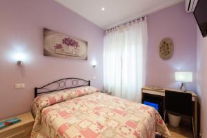 Postel nebo postele na pokoji v ubytování Guest House Le Tre Spezie