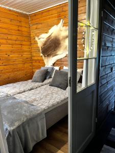 Postel nebo postele na pokoji v ubytování Villa Naava