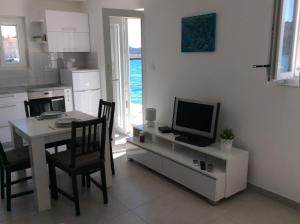 Kuchyň nebo kuchyňský kout v ubytování Apartment Zana