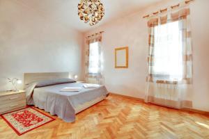 Postel nebo postele na pokoji v ubytování Locanda Delle Acque