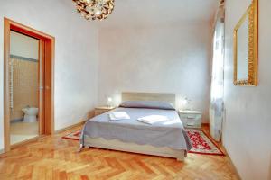 Postel nebo postele na pokoji v ubytování Locanda Delle Acque