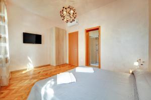 Postel nebo postele na pokoji v ubytování Locanda Delle Acque