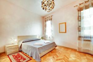 Postel nebo postele na pokoji v ubytování Locanda Delle Acque