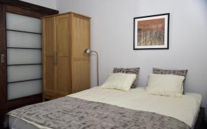 Ліжко або ліжка в номері BARTA Apartament Riga Old Town