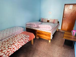 Postel nebo postele na pokoji v ubytování Hotel Hansdeep + 1 fotografie