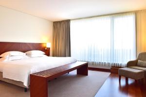 Cama ou camas em um quarto em Pousada De Viseu