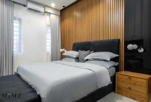 Ένα ή περισσότερα κρεβάτια σε δωμάτιο στο Dinmahomes