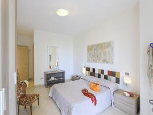 Ένα ή περισσότερα κρεβάτια σε δωμάτιο στο Grand Villa in Tavullia