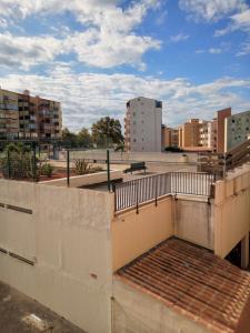 a view of a city with buildings in the background at studio cabine avec loggia Cap d Agde in Cap d'Agde