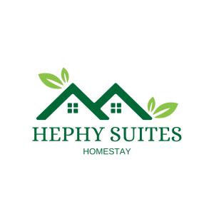un logo de maison avec des feuilles dessus dans l'établissement Hephy Suites and BnB, à Nairobi