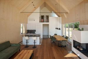 a living room with a couch and a table at Am Grassnitzberg in Grassnitzberg