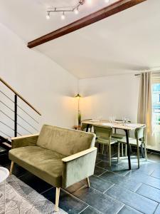 Posezení v ubytování Charmant Duplex rue des Allois - DABNB