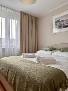 Postel nebo postele na pokoji v ubytování Komfortowa przystań nad morzem 2 pokoje