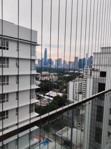 a view of a city from a building at Condo in Jalan Ampang- near KLCC IJN Gleneagles HKL TRX in Kuala Lumpur