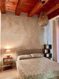 Postel nebo postele na pokoji v ubytování Casa Baldi