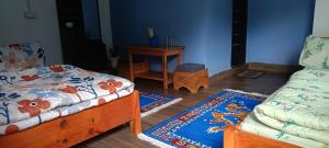 Ένα ή περισσότερα κρεβάτια σε δωμάτιο στο Eton Homestay +3 φωτογραφίες