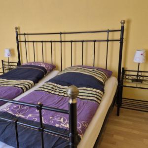 two bunk beds sitting next to each other in a bedroom at Haus Nordereck in Wustrow