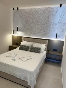Una cama o camas en una habitación de Infinity Palm Villa