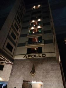 a building with the apollo sign on the side of it at Modern 2BHK Islamabad in Islamabad