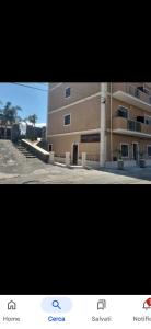 a picture of a building with a building at Albicocche house Catania in Catania