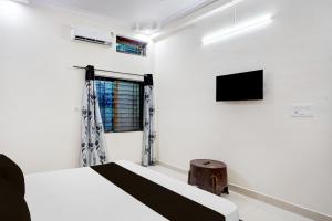 Μια τηλεόραση ή/και κέντρο ψυχαγωγίας στο Hotel O STAY INN +21 φωτογραφίες