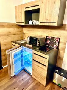 Η κουζίνα ή μικρή κουζίνα στο Apartment 2