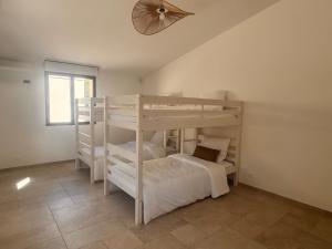 Ένα ή περισσότερα κρεβάτια σε δωμάτιο στο Superbe Villa Arià avec piscine chauffée +44 φωτογραφίες