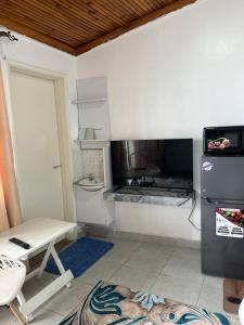 TV a/nebo společenská místnost v ubytování Studio Guest House