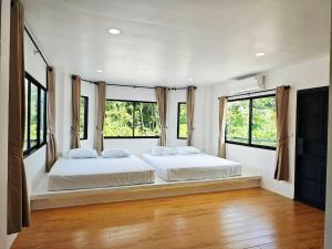 Postel nebo postele na pokoji v ubytování Home Cactus Pool Villa Chiangmai + 29 fotografií