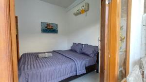 Katil atau katil-katil dalam bilik di Abhista Homestay