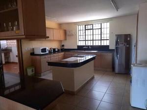 Nhà bếp/bếp nhỏ tại Kahawa Tranquil Apartment +4 ảnh