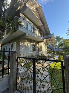 a house with a gate in front of it at The Rock of Ages Resort 