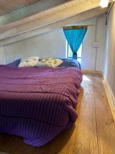 Postel nebo postele na pokoji v ubytování Lugar bonito tiny house