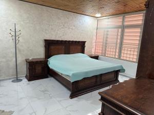 Ένα ή περισσότερα κρεβάτια σε δωμάτιο στο New Rooftop 3 bedroom furnished apartment- Super deluxe