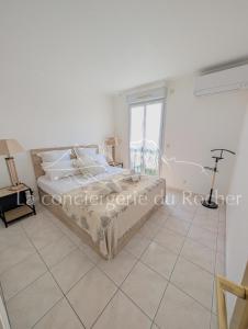 Postel nebo postele na pokoji v ubytování La Pilatine sublime appartement 2 personnes mer à pied