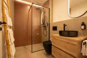Koupelna v ubytování Das Sonneneck Appartements + 63 fotografií
