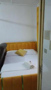 Ένα ή περισσότερα κρεβάτια σε δωμάτιο στο Chao Homes