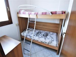 Ένα ή περισσότερα κρεβάτια σε δωμάτιο στο Holiday Home in Rosolina Mare near Beach