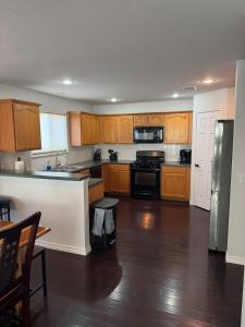Η κουζίνα ή μικρή κουζίνα στο Family Friendly, Relaxing home in Great Location