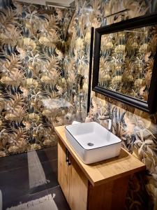 Koupelna v ubytování Apartament w sercu Elbląga + 2 fotografie