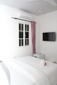 Postel nebo postele na pokoji v ubytování Fathikoyhe