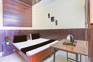 Ένα ή περισσότερα κρεβάτια σε δωμάτιο στο Hotel O cozy suits