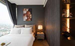 Ένα ή περισσότερα κρεβάτια σε δωμάτιο στο Ruby Luxurry Apartment - LUMIERE Riverside +81 φωτογραφίες