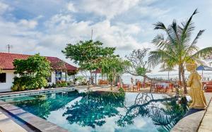 an image of a swimming pool in a resort at Scoobydoo Bungalow in Nusa Lembongan