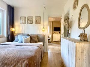 Postel nebo postele na pokoji v ubytování Tiny Ferienhaus 3 am Rimbach in Steinau an der Strasse