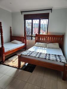 Ένα ή περισσότερα κρεβάτια σε δωμάτιο στο Jackies place