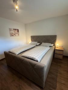 Postel nebo postele na pokoji v ubytování Haus Jäger + 17 fotografií