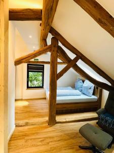 a bedroom with a bed in a attic at Eibenhaus in Bad Iburg