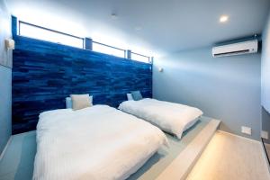 Postel nebo postele na pokoji v ubytování Villa Uminosora - Vacation STAY 92909v + 23 fotografií