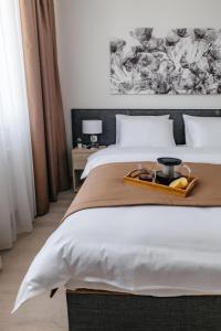 Ένα ή περισσότερα κρεβάτια σε δωμάτιο στο Torre apart hotel by Windham